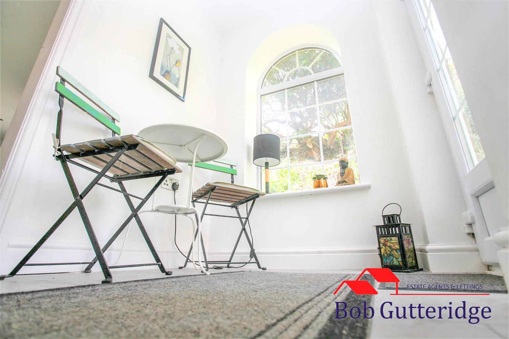 REAR RECEPTION AREA/SUN ROOM